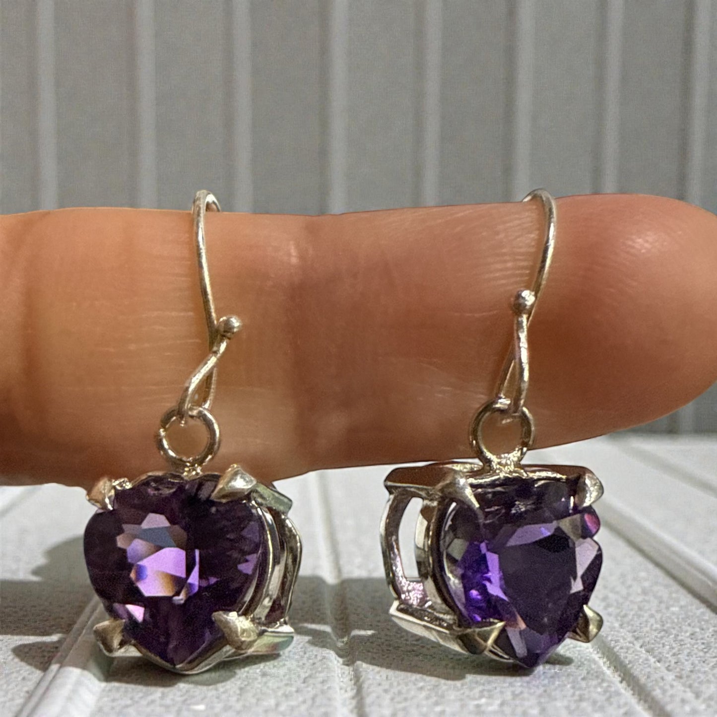 Amethyst heart shaped dandling silver earrings